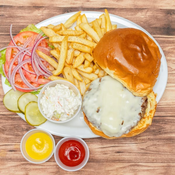 Allegro Pizza's cheeseburger with fries, coleslaw, pickles, lettuce, tomato, onion, mustard, and ketchup.